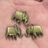 Accesorios de aleación de plata de Xizang retro estilo antiguo bronce elefante bebé flor DIY material de cuentas hecho a mano joyería al por mayor