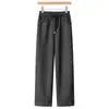 Novos estilos de outono e inverno para mulheres de meia-idade e idosas: calças forradas com fleece e cós elástico, calças cigarette estilo mom, padrão espinha de peixe, calças casuais cropped