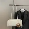 Bolso de mujer de moda 2026 primavera/verano nuevo bolso de hombro para ir al trabajo, moderno, simple, diseño de nicho
