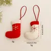 Calcetines de navidad tejidos transfronterizos colgante pequeño decorativo DIY atmósfera navideña decoración de árbol de navidad calcetines para colgar en stock