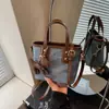 Bolso Pequeño Retro de Alta Gama Transfronterizo Nuevo Bolso de Mujer 2025 Bolso Cruzado Versátil de Moda Bolso de Mano de Moda Bolso Cubo