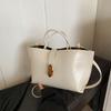 Bolsa de mão grande de primavera de 2025, bolsa feminina nova moda estilo ocidental, bolsa transversal para viagem, bolsa tote para viagem
