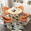 Conjunto de mesa e cadeiras para negociação loja comercial recepção reunião mesa redonda pequena área de descanso simples casual uma mesa quatro cadeiras mesa de jantar