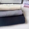 Ropa de punto para niñas al por mayor, Nuevas prendas de punto básicas versátiles de otoño e invierno con cuello de encaje, Tops interiores de manga larga para niños y bebés