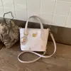 Bolso Cruzado de Hombro Casual de Nicho Nuevo Primavera 2026 para Mujer, Bolso Cubo Cruzado Dulce de Gran Capacidad Simple y Elegante