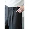 Pantalones casuales para hombre de lana con textura de espiga y cintura semi-elástica, colección otoño 2026, estilo de pierna recta con una estética "old money"