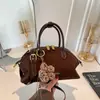 Bolsa de couro com cera de óleo de alta qualidade para mulheres 2026 novo estilo luxo leve toque de alta qualidade bolsa de mão versátil para o dia a dia bolsa de ombro bolsa transversal