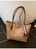 Bolso tote de gran capacidad para commuting para comercio exterior, nuevo bolso de hombro vintage 2026, versátil, simple, bolso de hombro y bandolera de alta gama