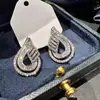 Brincos Populares de Alta Qualidade Shein de Cao Shi para Mulheres, Brincos com Design Vazado de Gota d'Água, Moda Urbana de Luxo Leve