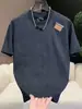 Moda de Verano 2025 Marca Europea de Lujo Ligero de Moda Camiseta Fresca Personalizada Bordada de Cuello Redondo de Manga Corta para Hombre
