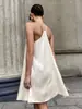 Vestido Cruzado Sencillo con Tirantes Finos Estilo Europeo y Americano Primavera 2026 Nuevo Sexy Espalda Cruzada Satín Corto