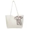Bolso tote para mujer, nicho transfronterizo 2026 nuevo bolso tejido, bolso casual de gran capacidad para mujer, bolso de hombro estilo coreano