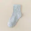 Meias infantis meninas Zhuji meias esportivas brancas atacado primavera e outono meias absorventes de suor meninos e estudantes meias brancas