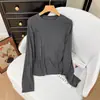 Camiseta elástica de mezcla de cachemira suave y pegajosa, amigable con la piel, de venta caliente, camiseta casual de manga larga para mujer de alta gama, capa base de otoño e invierno