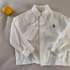 Camisas de primavera y otoño para niños y niñas, ropa de bebé elegante, diseños modernos y únicos, estilo de Hong Kong y coreano, bordadas, para exportación, camisas de moda