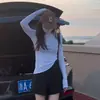 Camiseta Blanca de Manga Larga Transparente Estilo Coreano Versátil para Mujer Otoño 2024 Nueva Ajustada Adelgazante Camisa Base Top Elegante