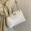 Bolsa de corrente com trama de losangos feminina 2026 novo outono alta qualidade retrô luxo leve para o dia a dia bolsa de ombro única bolsa tiracolo tipo balde