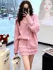 Conjunto de cárdigan de punto rosa dulce y juvenil estilo francés y falda para mujer, otoño e invierno, diseño elegante, conjunto de dos piezas que estiliza