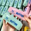 Nuevo palito de mantequilla crujiente, súper húmedo y suave, popular y lindo producto nuevo japonés, mismo estilo que los populares en línea, juguete de comida para dedos de dibujos animados suave