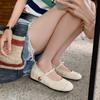 Zapatos Mary Jane de verano 2024 con punta redonda, boca baja, suela plana y aumento de altura, estilo festivo, estilo paja, de una sola capa.