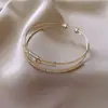 Pulseira Aberta Bicolor com Pingente de Gota e Cruz Brilhante Design de Pulseira com Personalidade Moda Europeia e Americana Joias de Nicho para Mulheres Atacado