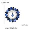 Nuevo broche de aleación vintage de estilo europeo y americano con diamantes de imitación redondos con ramillete colgante, accesorios de ropa para mujer, disponible en stock.