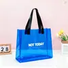 Venta Directa de Fábrica Bolsa de Gelatina Gruesa Arcoíris de PVC Bolsa de Recuerdo Láser de Alta Calidad Bolsa Transparente para Regalo Bolsa