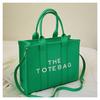 Bolso de mano para mujer con estampado de lichi, ideal para comercio exterior transfronterizo. Bolso bandolera de alta gama con estampado de letras.