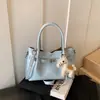 Bolso de mano vintage de nicho estilo coreano, nuevo modelo verano 2026, gran capacidad, simple, adecuado para ir al trabajo, bolso tipo cubo de un solo hombro cruzado