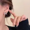 Pendientes de plata 925 con forma de mariposa y circonita hueca, estilo francés, con temperamento de hada súper elegante y delicado estilo de hada.
