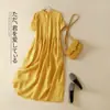 Foto Real de Vestido Camisero Casual Holgado de Manga Corta de Color Sólido de Algodón y Lino Estilo Nuevo Verano 2026 para Mujer, de Longitud Media