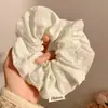 Goma para el pelo azul floral pequeña estilo pastoral para mujer, nuevo accesorio para el pelo grande para coleta baja francesa de primavera 2026
