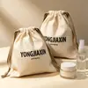 Bolsa con cordón de algodón-poliéster reciclado, tela ecológica, bolsa de almacenamiento a prueba de polvo para perfumes y productos para el cuidado de la piel, logotipo personalizado disponible