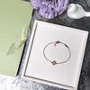 Pulsera de trébol de cuatro hojas mini tallada a CNC versión alta en oro V para mujer, moda de lujo ligero, elegante joyería de mano