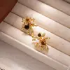 Aretes Maillard Fuego Artificial Dorado Ojo de Tigre Populares Elegantes Accesibles Joyería de Lujo Estilo Fresco de Gama Alta Aretes Únicos