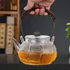 Tetera de vidrio resistente al calor para preparar té, utilizable en estufa eléctrica de cerámica, hervidor, hervidor de vidrio creativo de capullo de loto, juego de té de vidrio, nuevo estilo chino