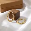 Pendientes de Textura de Alambre Metálico Moda Diseño de Trenza Retorcida Aros Simples Versátiles Cierres de Pendiente Venta al por Mayor Directa de Fábrica
