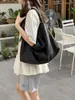 Bolsa de tela de gran capacidad, versátil, ligera, estilo perezoso, para el día a día, 2026, nuevo, color sólido, textura, moda, bolso de axila/hombro