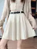 Falda midi plisada de lana tejida blanca para mujer, adecuada para primavera y otoño, falda de línea A de cintura alta que acentúa las caderas, combinada con botas largas o usada como falda corta