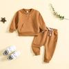 Ropa infantil transfronteriza Primavera y Otoño nuevo conjunto de dos piezas de suéter de manga larga de color liso bordado con letras y pantalones entrega de una sola pieza