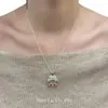 Colar Pingente de Guirlanda com Laço de Ano Novo, Doce e Delicado, Único e de Alto Padrão, Corrente de Clavícula Versátil e Moderna para Mulheres