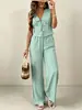 Conjunto de dos piezas estilo resort hecho a medida: Top sin mangas con cuello en V y cintura de corbata combinado con pantalones anchos fluidos