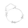 Pulseira Simples de Laço com Corrente Osso de Cobra para Mulheres, Design de Nicho Exquisito de Luxo Leve, Joia de Mão de Alto Padrão Novo Estilo 2025