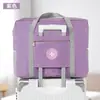 Bolsa de viagem de avião transfronteiriça cor sólida tote grande bolsa trolley com logo redondo bolsa de viagem dobrável bolsa de viagem para roupas bolsa portátil
