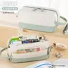 Nuevo estuche de doble capa de gran capacidad en color crema con alto atractivo estético, adecuado para niñas, bolsa de lápices simple para estudiantes de primaria y secundaria