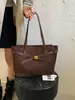 Bolsa de Mujer de Venta Caliente Transfronteriza Hebilla de Cierre Bolso Tote Clásico Versátil Bolso Sencillo de Hombro Único para el Trabajo Bolso de Mano con Sensación de Alta Gama
