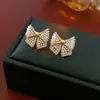 Pendientes de borla con forma de gota de agua y mariposa de circón estilo coreano, pendientes de lujo ligero de alta gama, modernos y exquisitos, versátiles para ir al trabajo, accesorios para orejas