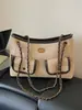 Bolso retro de ante a la moda 2026 nuevo bolso cruzado versátil para mujer con un toque de alta gama para ir al trabajo, bolso de hombro único bajo el brazo