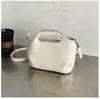 Bolso de cubo de piel aceitada plisada estilo coreano para mujer, nuevo modelo 2026, bolso de hombro versátil de alta gama vintage para el día a día