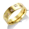 Anel de aço inoxidável em formato de coração europeu e americano mais vendido para mulheres, banhado a ouro 18K, não desbota, com garra e pedra, pulseira simples de amor, atacado